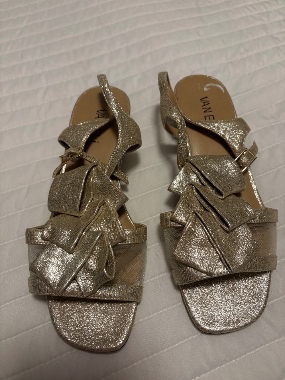 Van Eli short gold heel 6